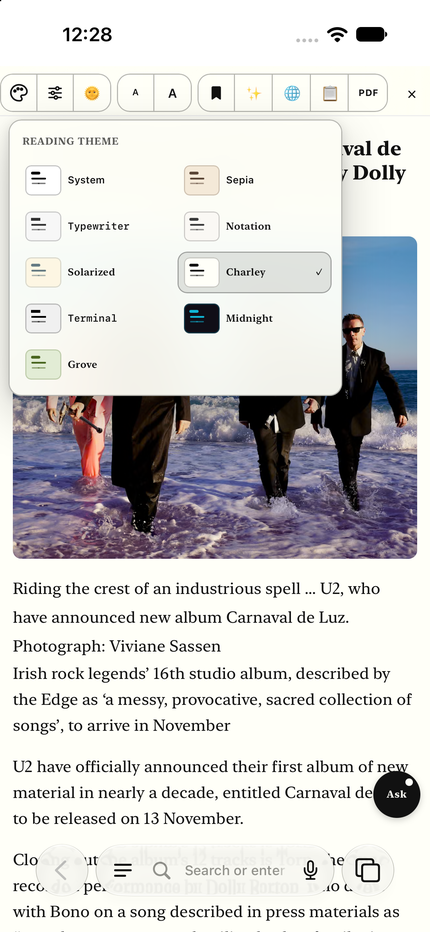 The iPhone reader using the Terminal theme: monospaced text with the same reading toolbar.