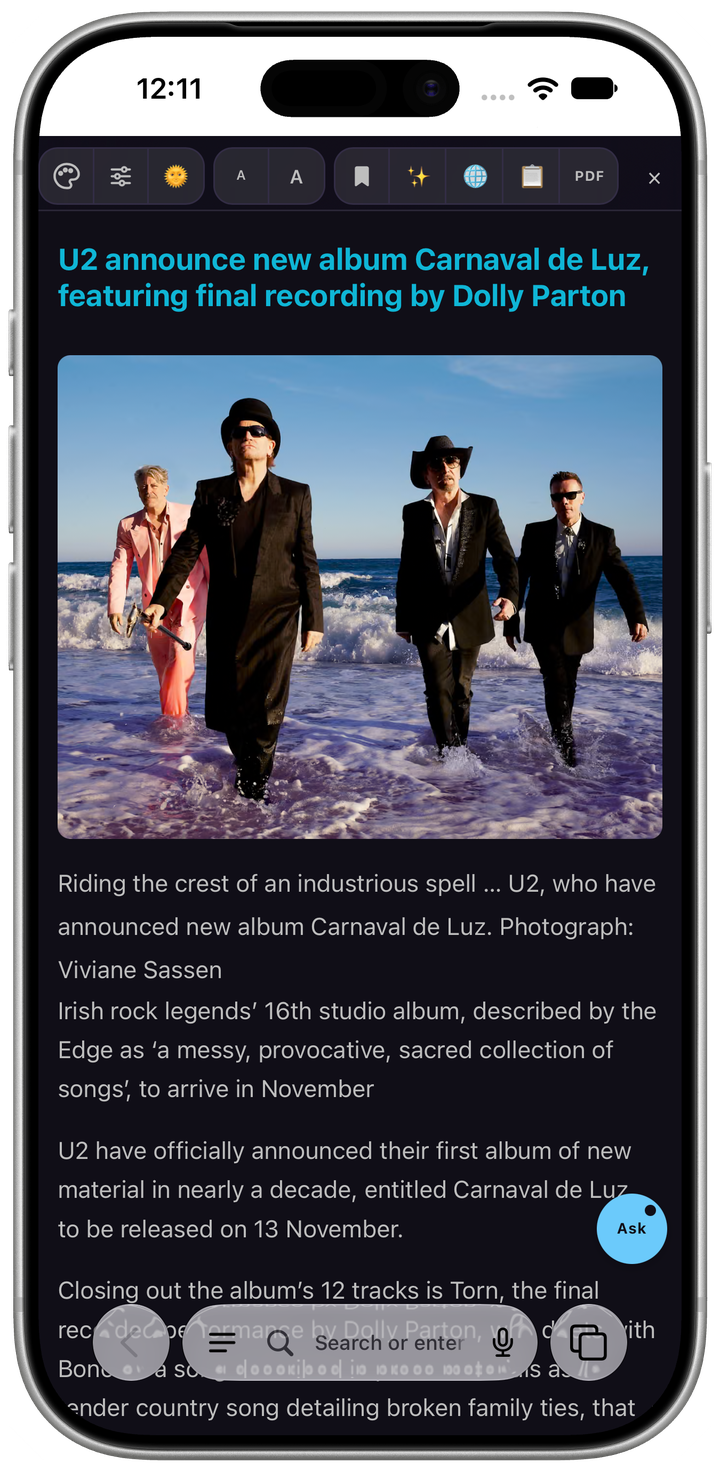AreaderZ on an iPhone in dark mode: The Guardian's U2 article open in the reader — one column, the article's photograph, and nothing else on the page.